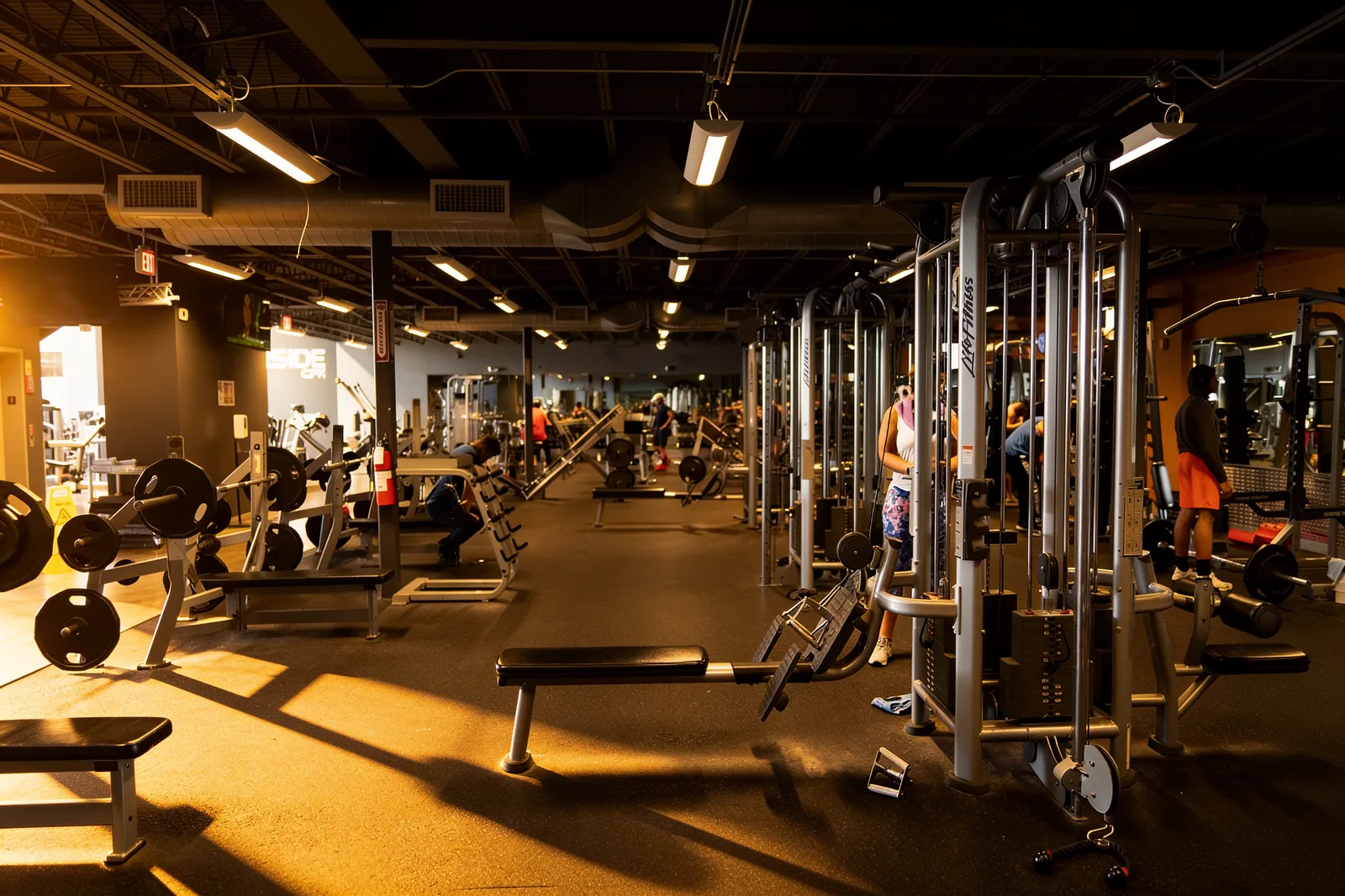 Free weights floor at a CFX gym, open 24/7